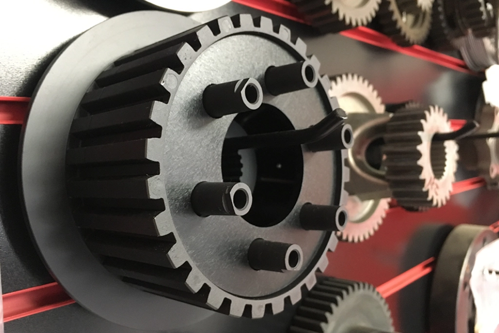 Wall of gears and automotive equipment inside Uncle Al's Gladstone OR location.