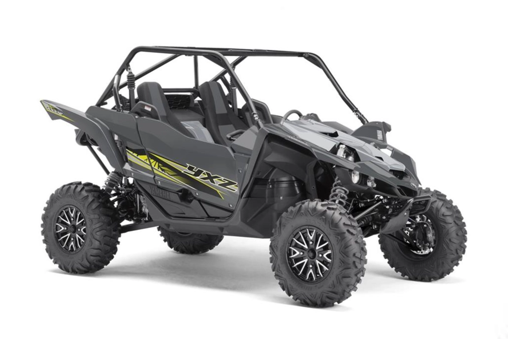 Closeup of Yamaha YXZ all-terrain-vehicle against a white background. Uncle Al's ASE certified technicians specialize on these.