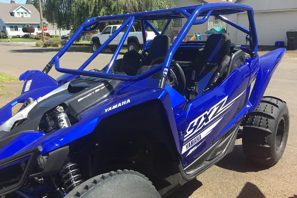 Photo of a blue Yamaha YXZ four wheeler.