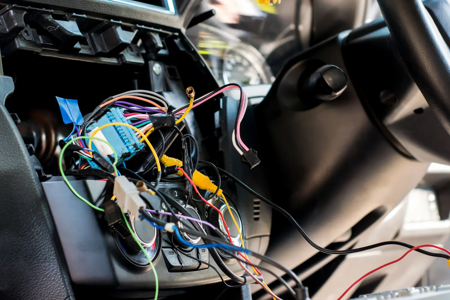 electrical wires pulled out in a car for repair